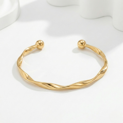 Damen Gedrehter Offener Armreif mit Kugelenden in Goldoptik | Shop Nory