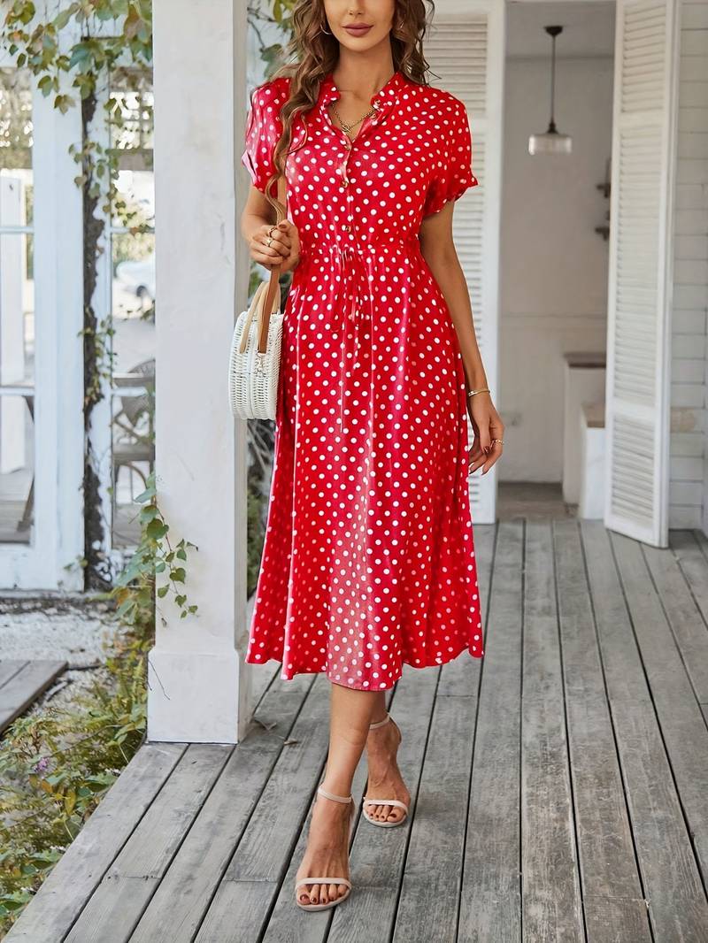 A-linien-kleid mit polka-dot-print und v-ausschnitt