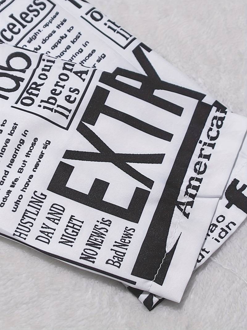 Hemdkleid mit Zeitungsdruck