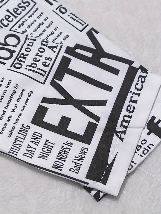 Hemdkleid mit Zeitungsdruck