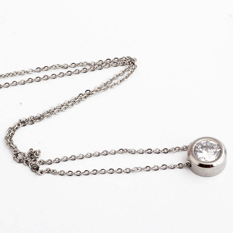 Damen Halskette mit funkelndem Zirkonia-Anhänger und eleganter Edelstahlkette Shop Nory