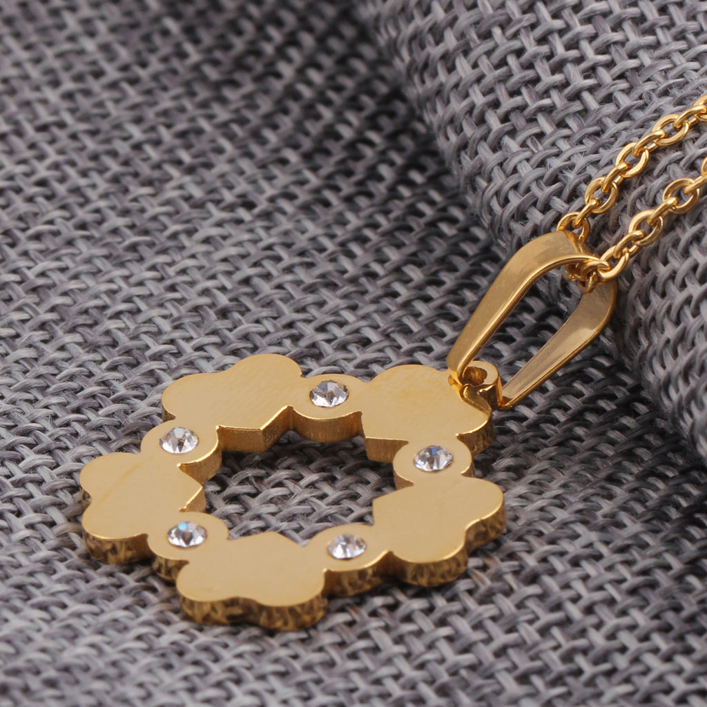 Damen Halskette mit blütenförmigem Anhänger und funkelnden Zirkonia Shop Nory