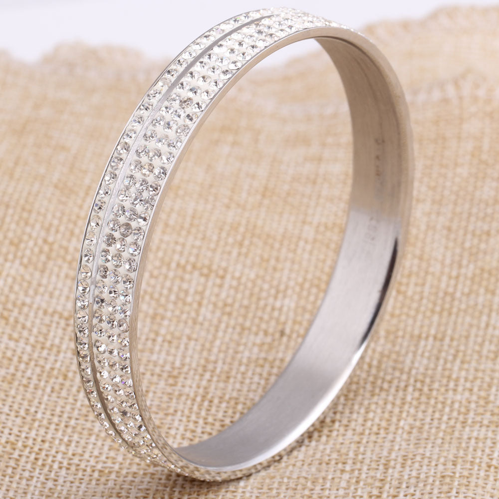 Damen Armreif mit funkelnden Zirkonia-Steinen und elegantem Design Shop Nory