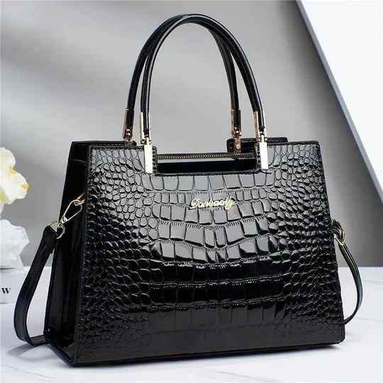 Frauen glänzende handtasche