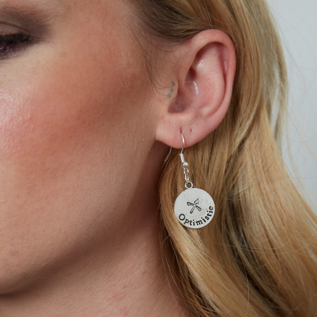 Silver Earrings With Reversible Zodiac Coin Charm | Shop Nory