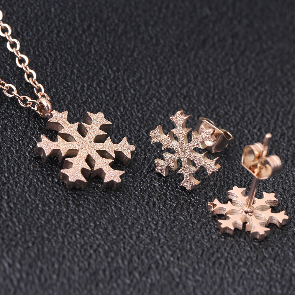 Damen Schmuckset mit funkelndem Schneeflocken-Anhänger und passenden Ohrringen Shop Nory