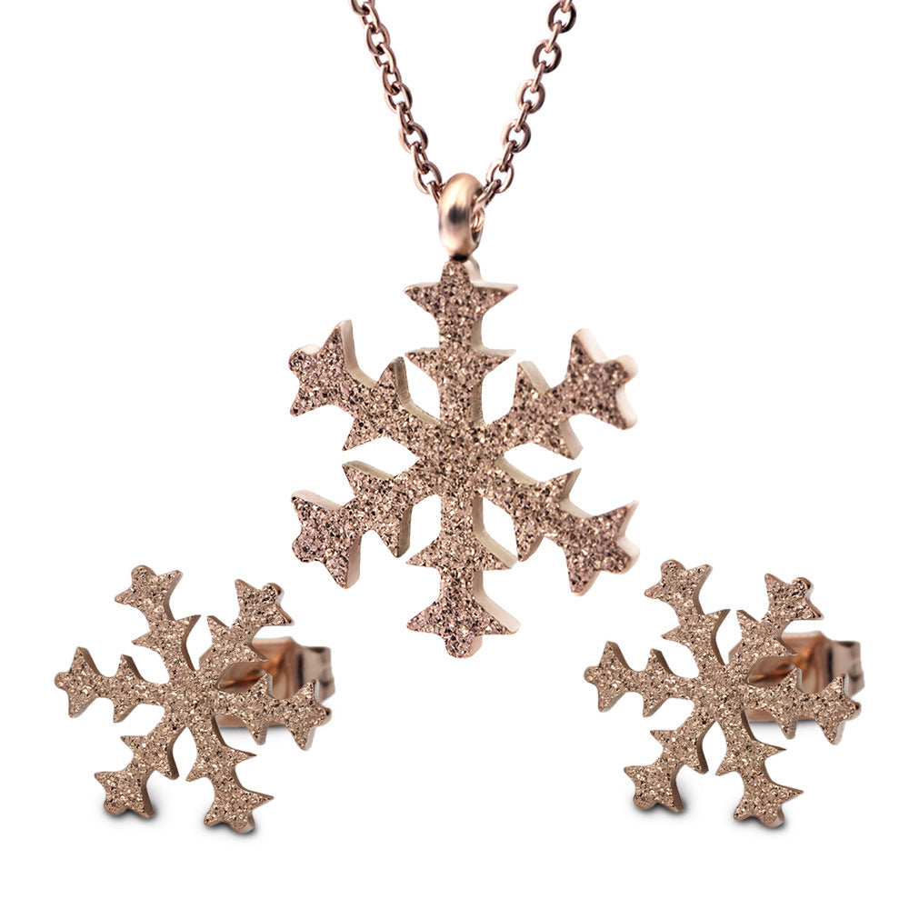 Damen Schmuckset mit funkelndem Schneeflocken-Anhänger und passenden Ohrringen Shop Nory