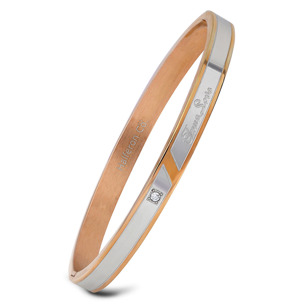 Damen Armreif mit elegantem zweifarbigen Design und funkelndem Zirkonia Shop Nory