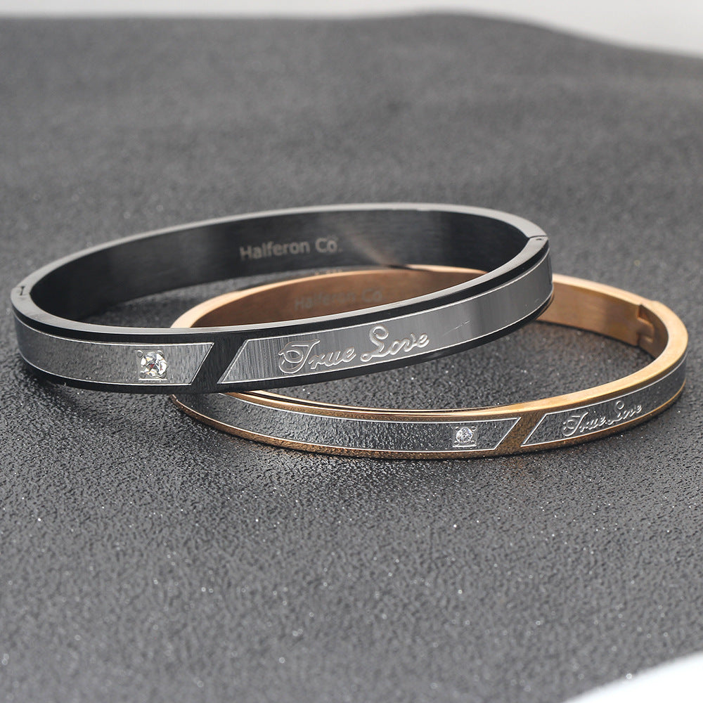 Damen Armreif mit elegantem zweifarbigen Design und funkelndem Zirkonia Shop Nory