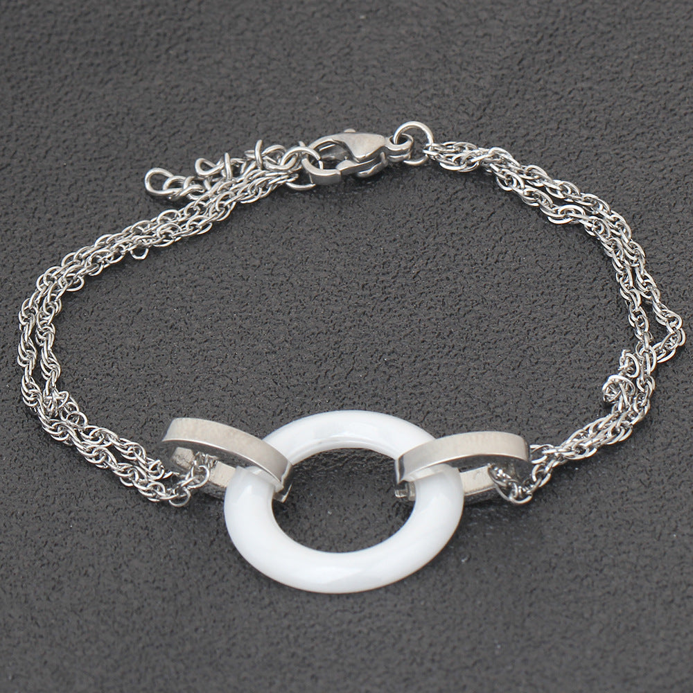 Damen Armband mit modernem Ring-Design und eleganten Metallakzenten Shop Nory