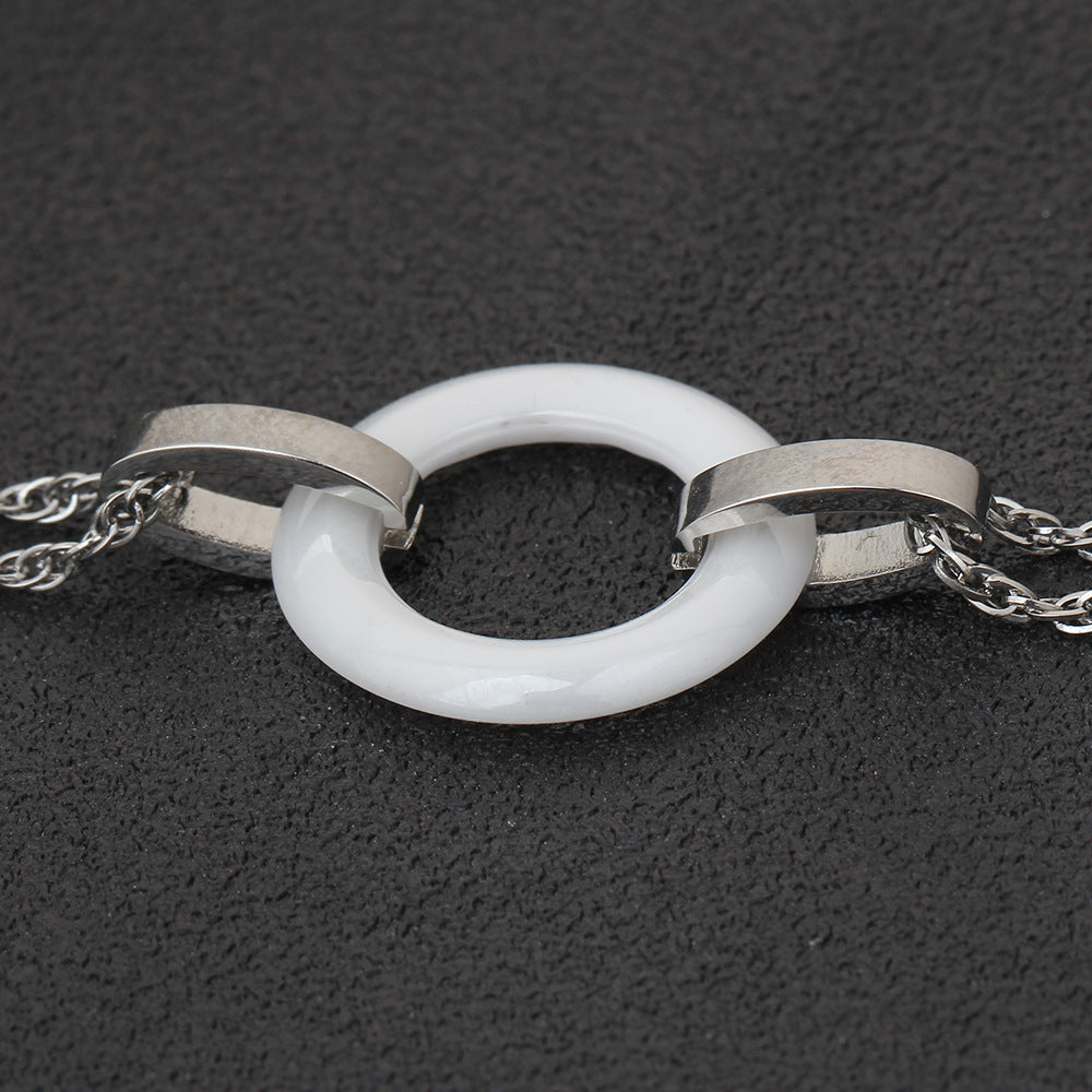 Damen Armband mit modernem Ring-Design und eleganten Metallakzenten Shop Nory