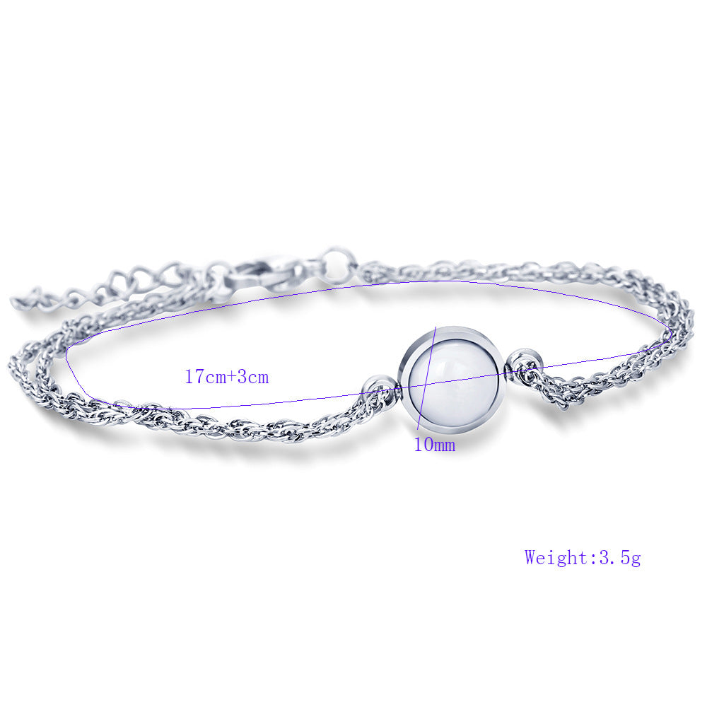 Damen Armband mit funkelndem Zirkonia und hochwertiger Edelstahlkette Shop Nory