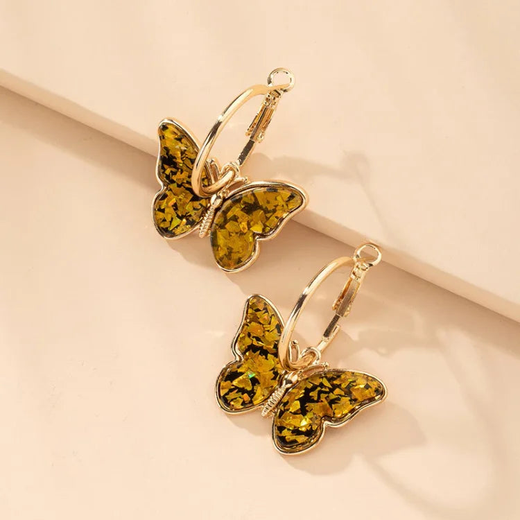 Vergoldete Schmetterlingsohrringe mit Acrylkristallen – Mariposa | Shop Nory