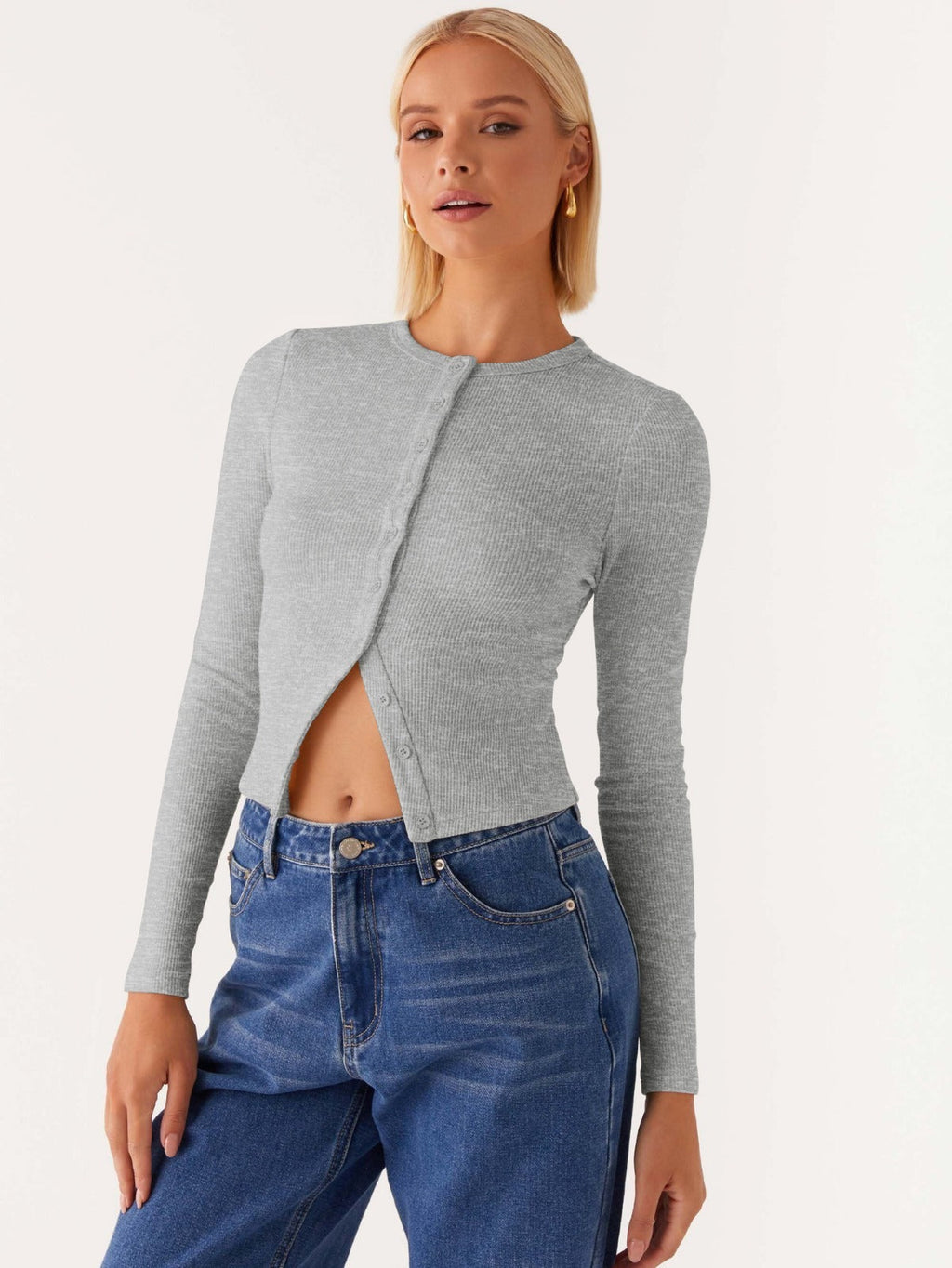 Einfarbige schmal geschnittene lange Strickjacke