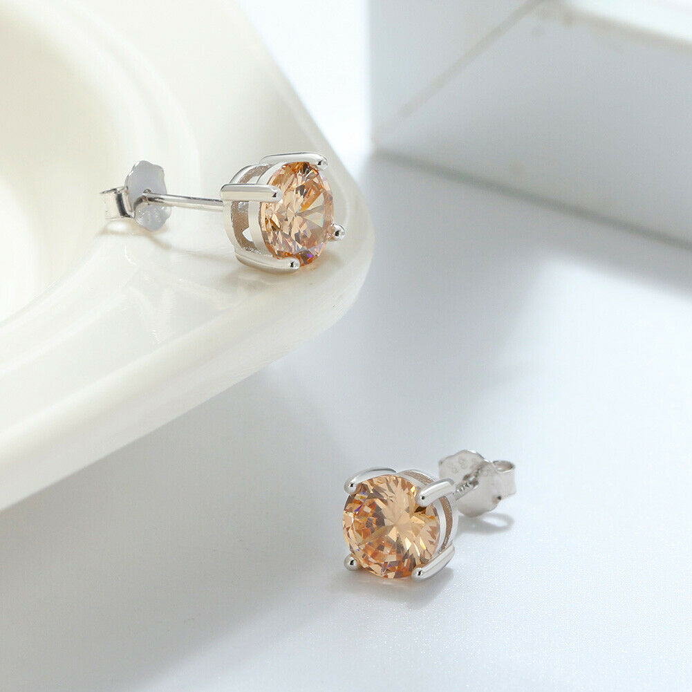 1 Paar runde Ohrstecker 925er Sterlingsilber Cubic Zirkonia champagner | Shop Nory