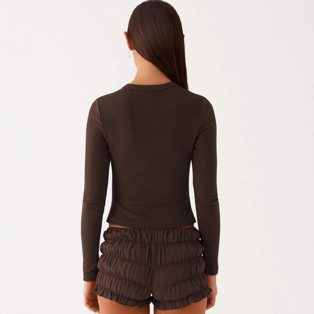 Einfarbige schmal geschnittene lange Strickjacke
