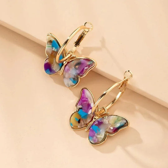 Vergoldete Schmetterlingsohrringe mit Acrylkristallen – Mariposa | Shop Nory