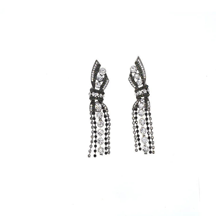 Schillernde Hängeohrringe mit Schleife – Annelise | Shop Nory