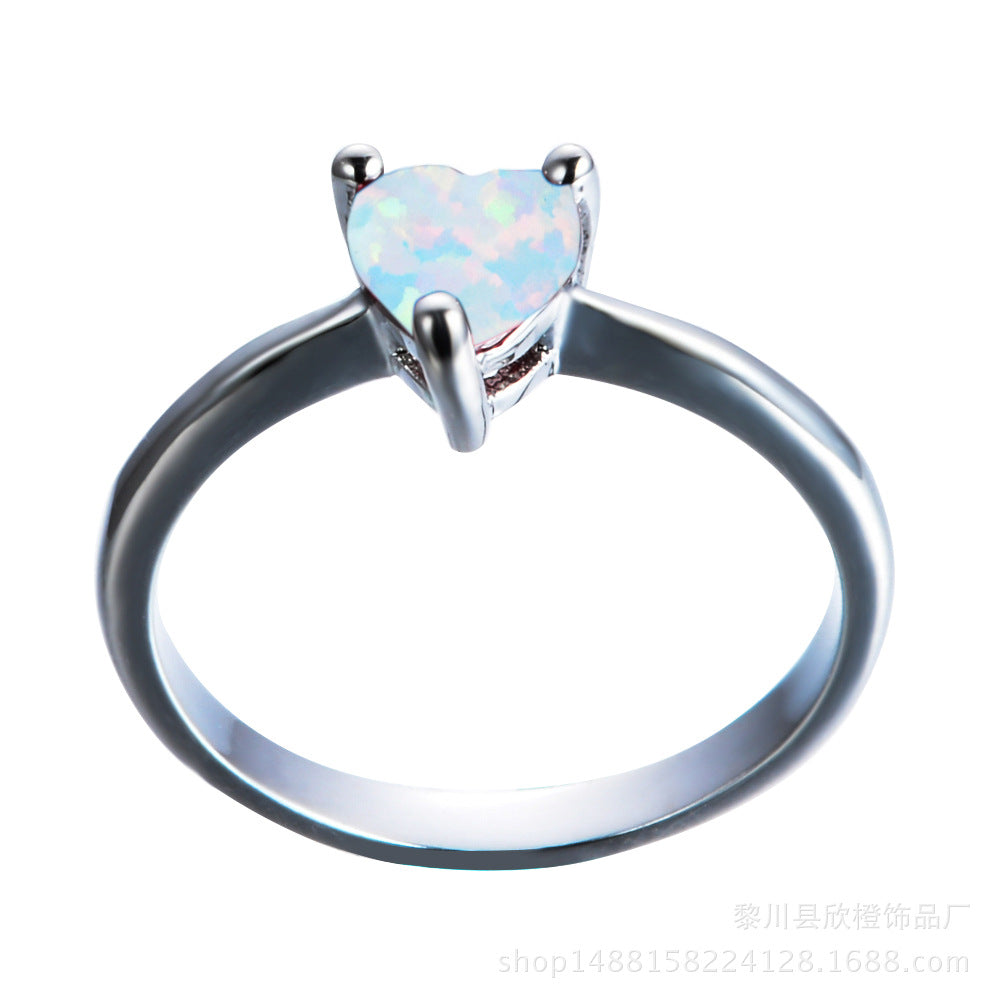 Damen Ring mit herzförmigem Opal und eleganter Zirkonia-Fassung Shop Nory