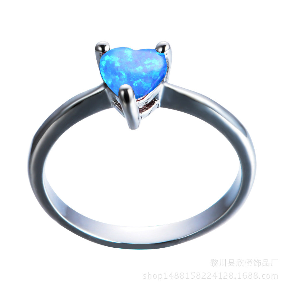Damen Ring mit herzförmigem Opal und eleganter Zirkonia-Fassung Shop Nory
