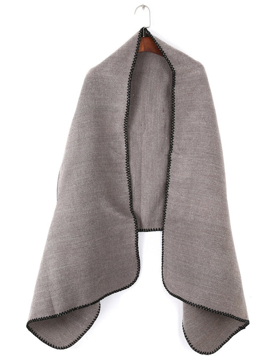 Damen Übergroßer Ruana-Poncho mit Armausschnitten und kontrastierender Kettelnaht Shop Nory