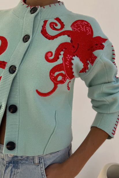 Küstenstrickjacke mit Oktopus-Motiv und Kontrastpaspelierung