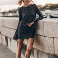Glitzerkleid mit offenem Rücken