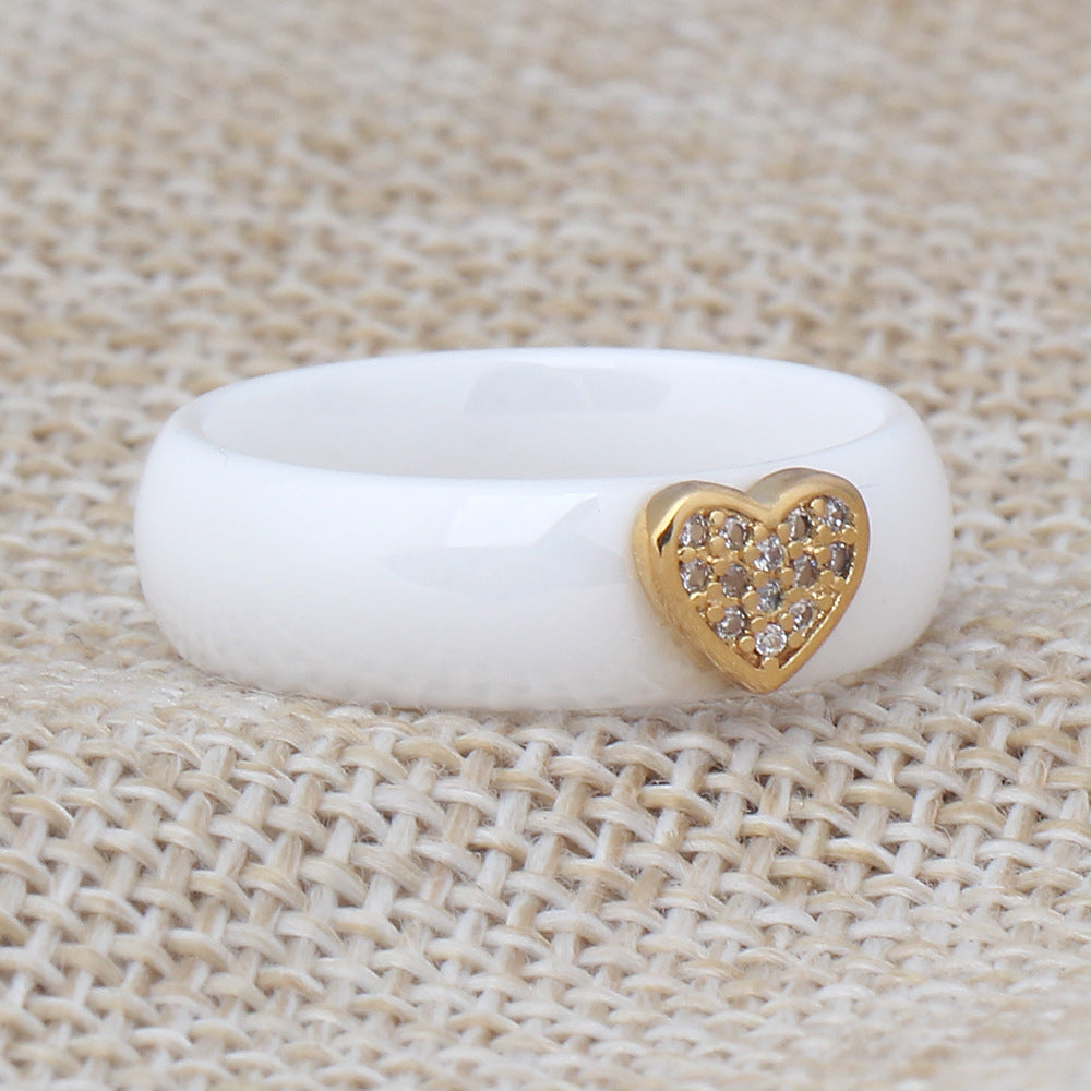Damen Ring mit herzförmigem Glitzerdesign und elegantem Goldakzent Shop Nory