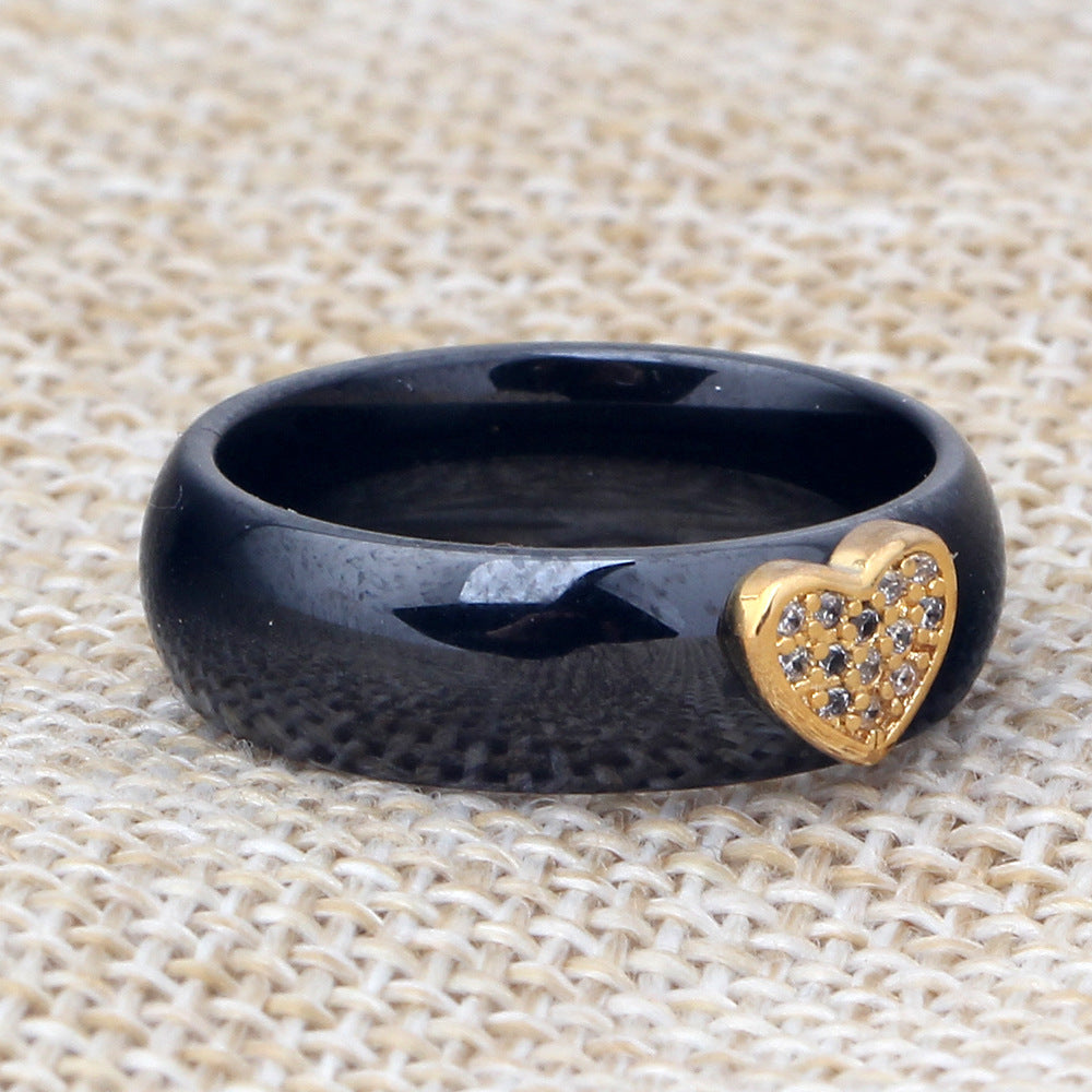Damen Ring mit herzförmigem Glitzerdesign und elegantem Goldakzent Shop Nory