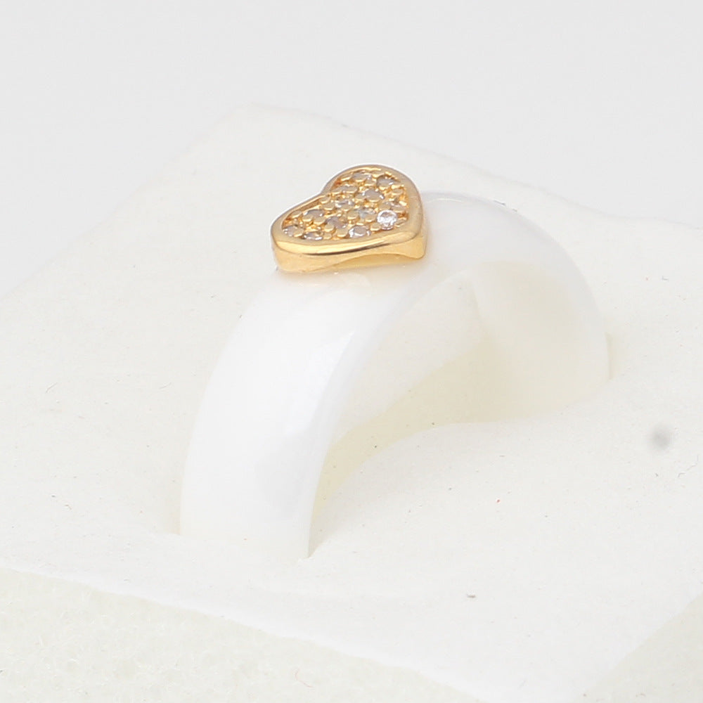 Damen Ring mit herzförmigem Glitzerdesign und elegantem Goldakzent Shop Nory