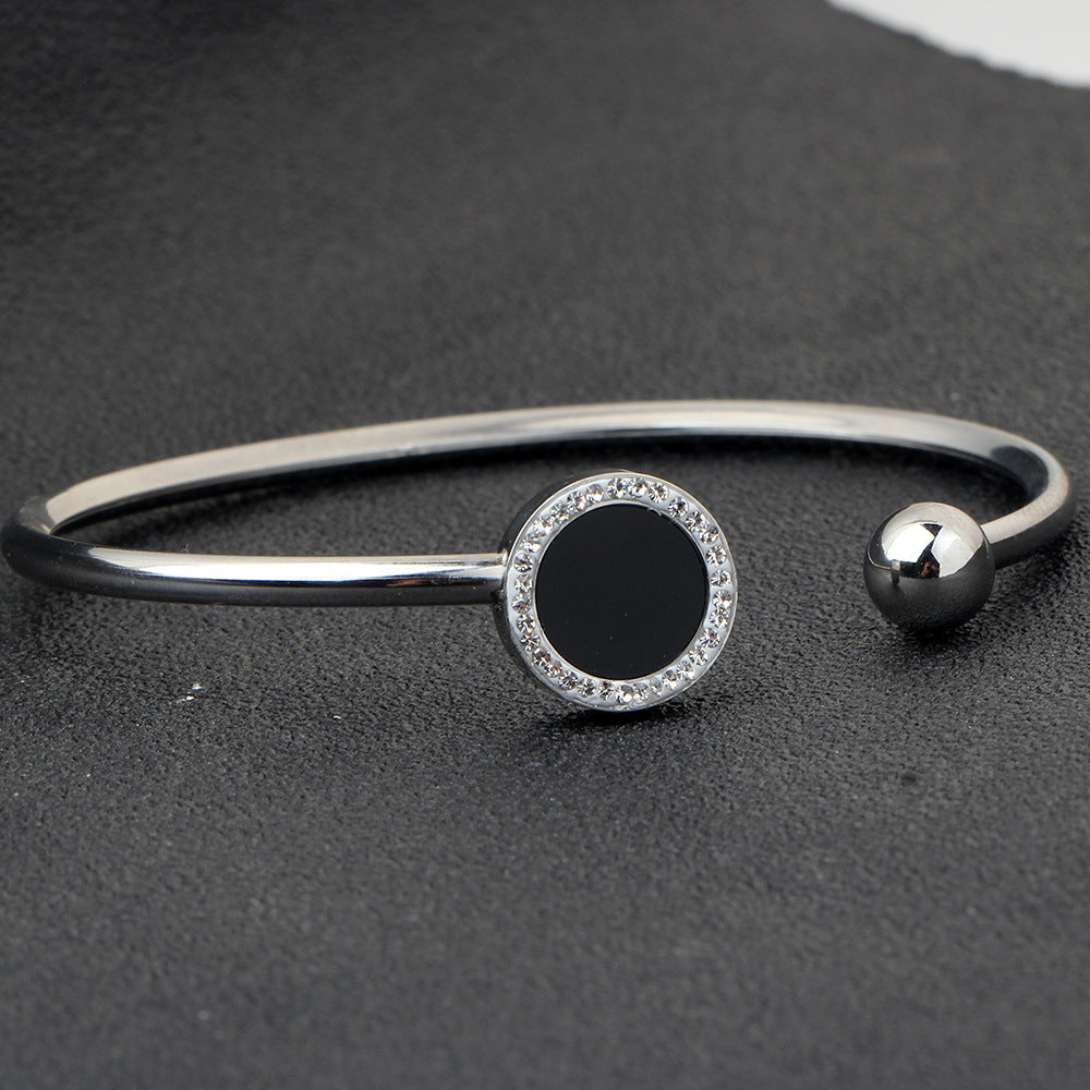 Damen Offenes Armreif mit funkelndem Zirkonia und elegantem schwarzen Stein Shop Nory