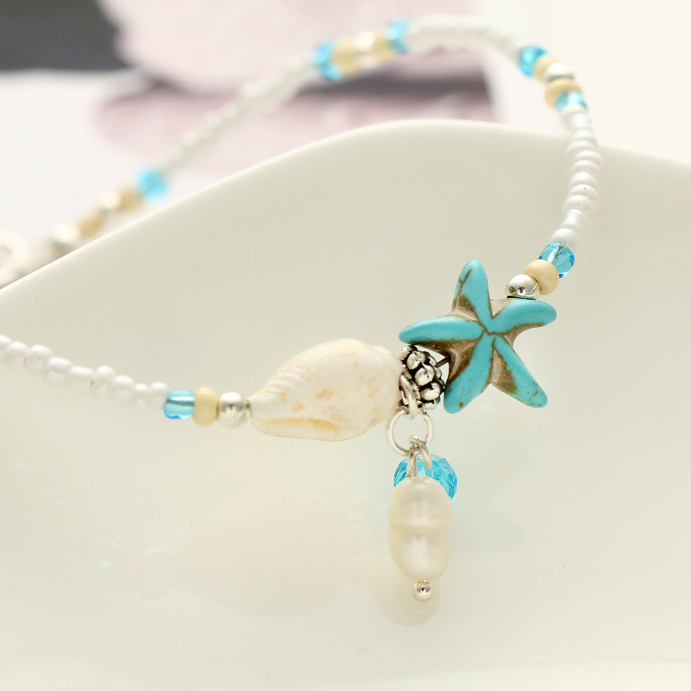 Damen Halskette mit maritimen Muschel- und Sternenanhängern Shop Nory