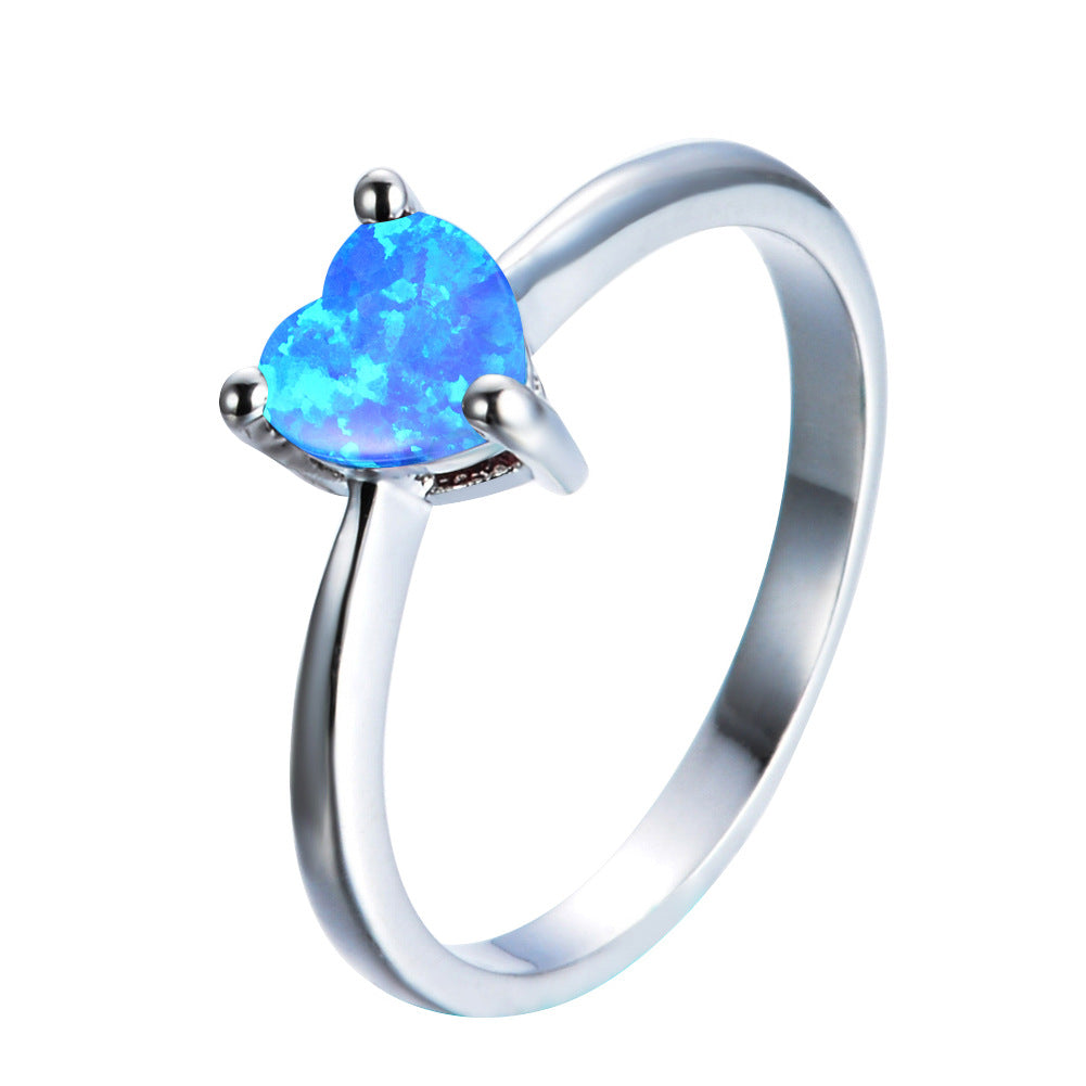 Damen Ring mit herzförmigem Opal und eleganter Zirkonia-Fassung Shop Nory