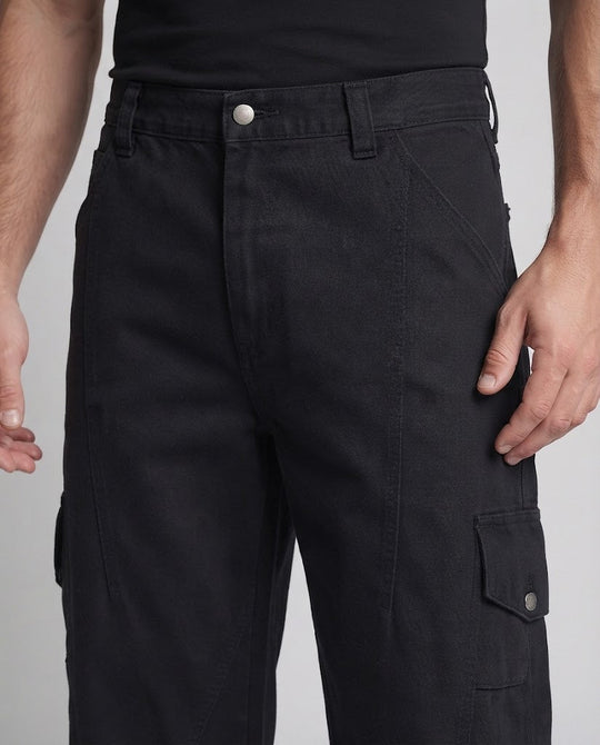 Herren Weite Utility‑Palazzo‑Cargo‑Hose aus robustem Canvas mit gerundeten Kniepaneelen und Druckknopf‑Seitentaschen Shop Nory