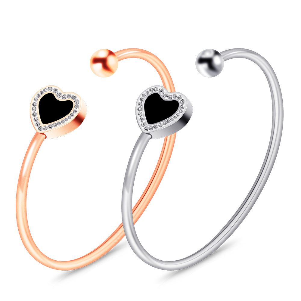 Damen Armreif mit herzförmigem Anhänger und Zirkonia-Besatz Shop Nory