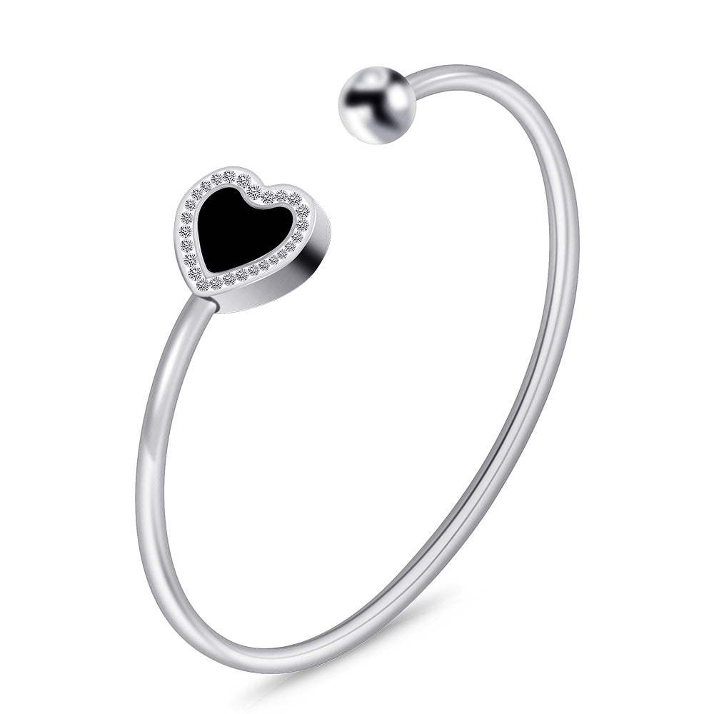 Damen Armreif mit herzförmigem Anhänger und Zirkonia-Besatz Shop Nory