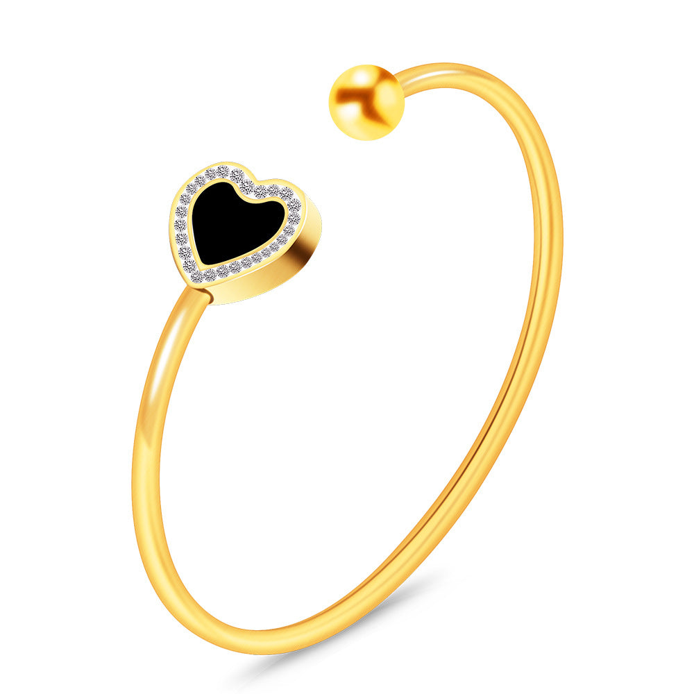 Damen Armreif mit herzförmigem Anhänger und Zirkonia-Besatz Shop Nory
