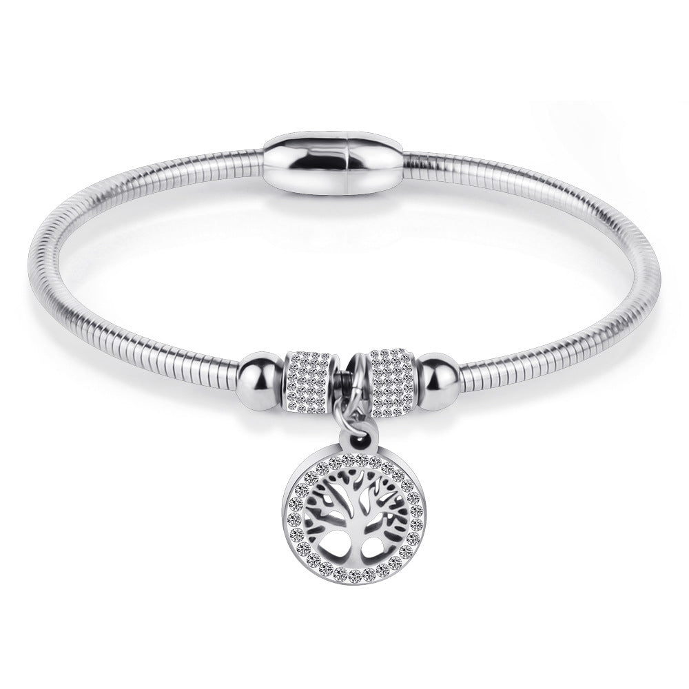 Damen Armreif mit filigranem Baum-des-Lebens-Anhänger und funkelnden Zirkonia Shop Nory