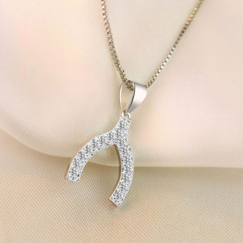 Damen Halskette mit funkelndem Wunschbone-Anhänger aus Edelstahl Shop Nory