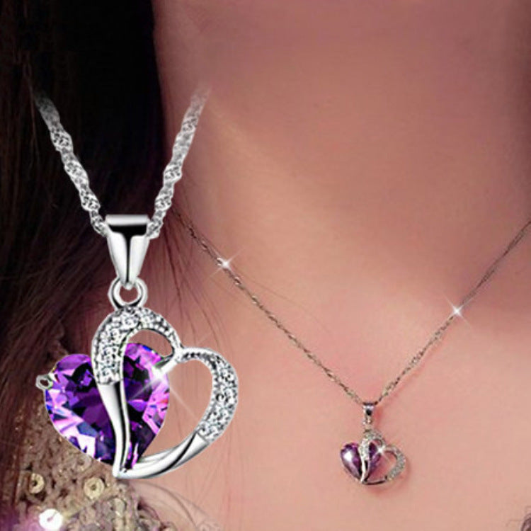 Damen Halskette mit herzförmigem Anhänger und funkelnden Kristallen Shop Nory