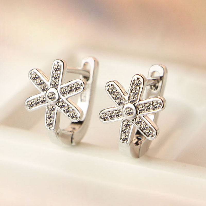 Damen Ohrstecker mit funkelndem Sternen-Design und elegantem Zirkonia-Besatz Shop Nory