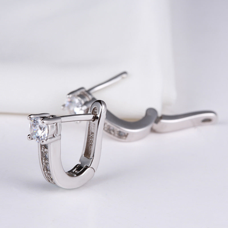 Damen Ohrringe mit funkelnden Zirkonia und modernem Design Shop Nory