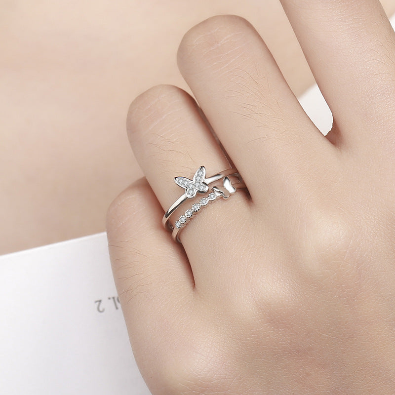 Damen Offener Ring mit kunstvollem Schmetterlingsdesign und funkelnden Zirkonia Shop Nory