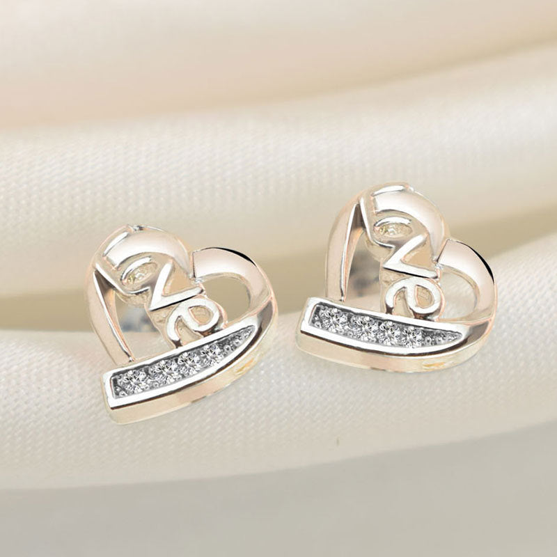 Damen Ohrringe mit herzförmigem Design und funkensprühendem Zirkonia-Besatz Shop Nory