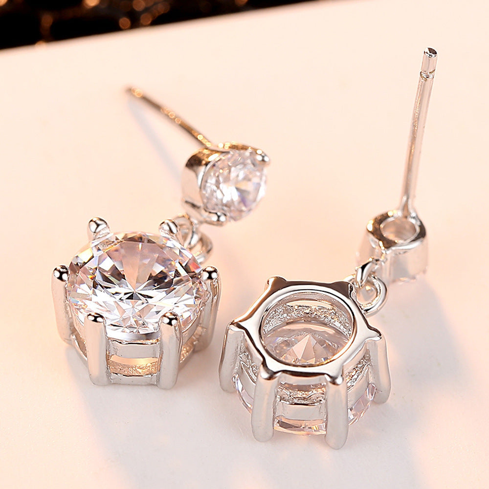 Damen Ohrstecker mit funkelnden Zirkonia und elegantem Design Shop Nory
