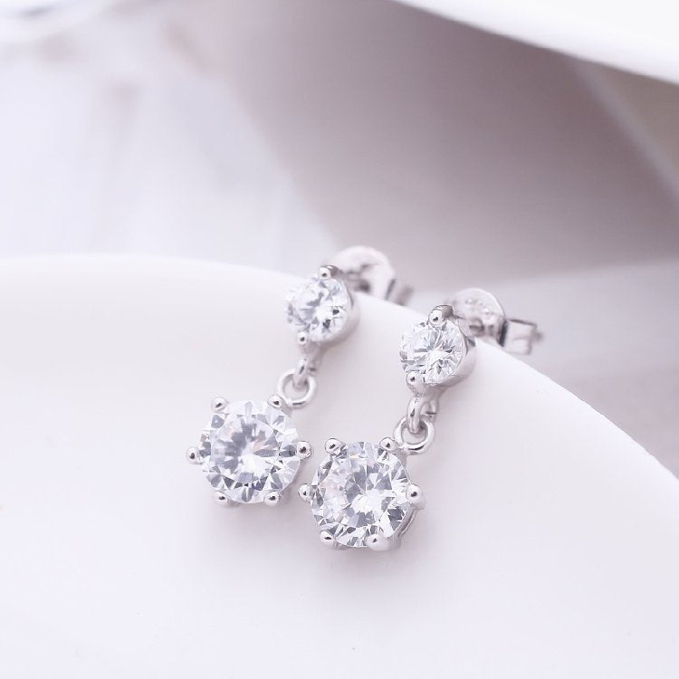 Damen Ohrstecker mit funkelnden Zirkonia und elegantem Design Shop Nory