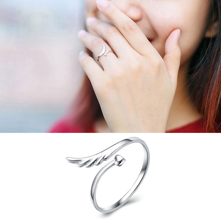 Damen offener Ring mit kunstvollem Flügel-Design und Herzen Shop Nory