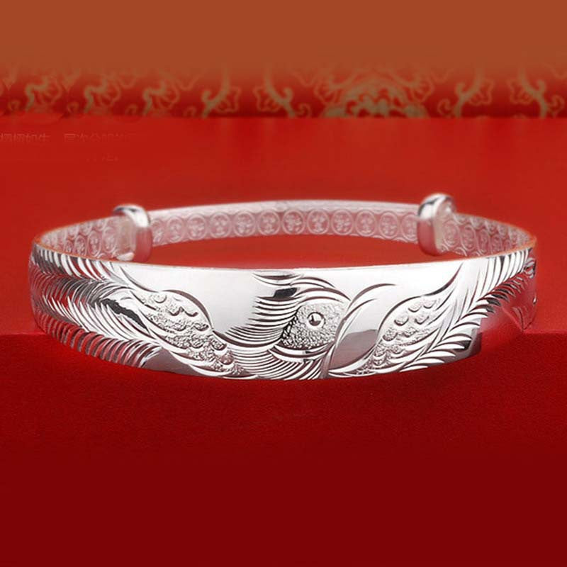 Damen Silberarmband mit kunstvollem Vogelmotiv und feiner Textur Shop Nory