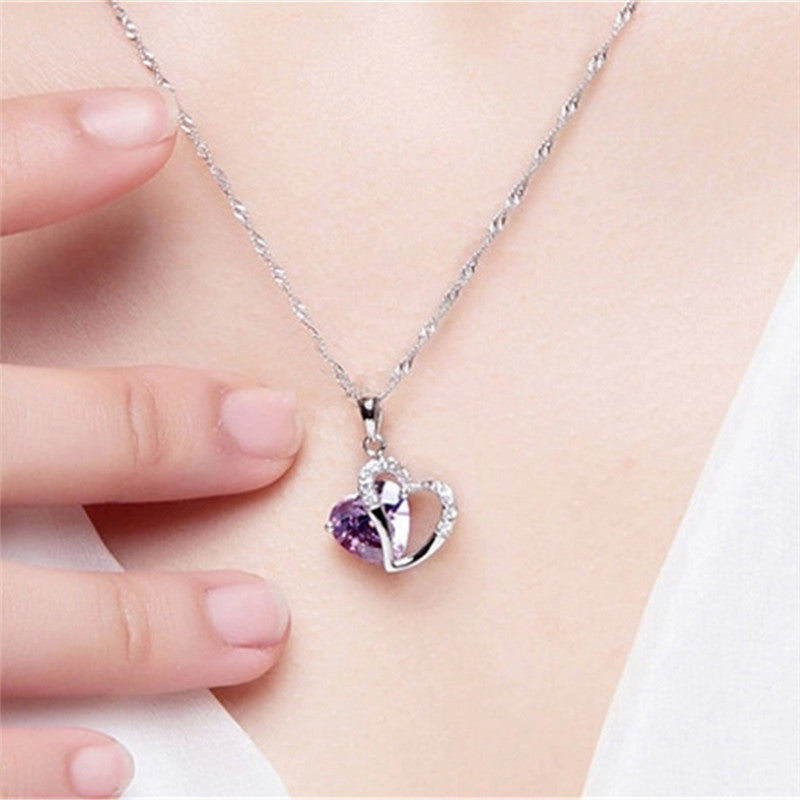 Damen Halskette mit herzförmigem Anhänger und funkelnden Kristallen Shop Nory