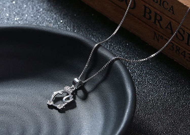 Damen Halskette mit verspieltem Vogel-Anhänger und funkelnden Zirkonia-Details Shop Nory